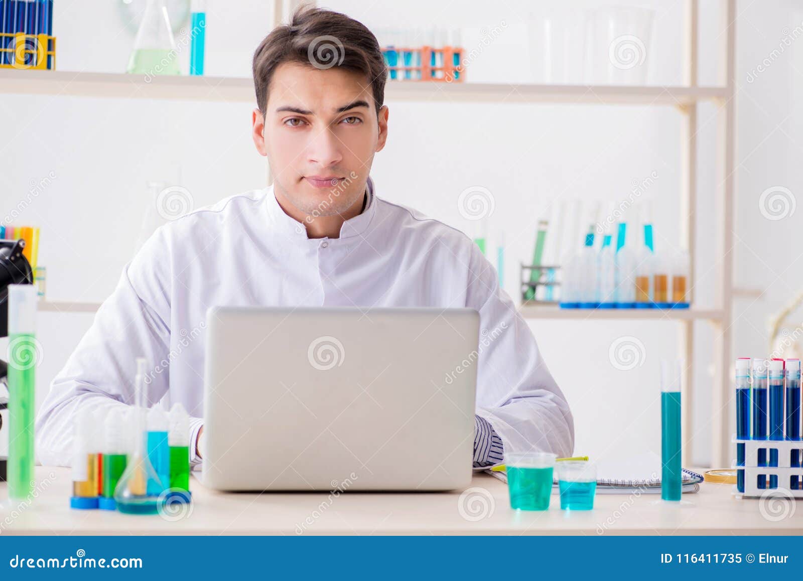 The Man Student Working in Chemical Lab on Experiment Stock Image