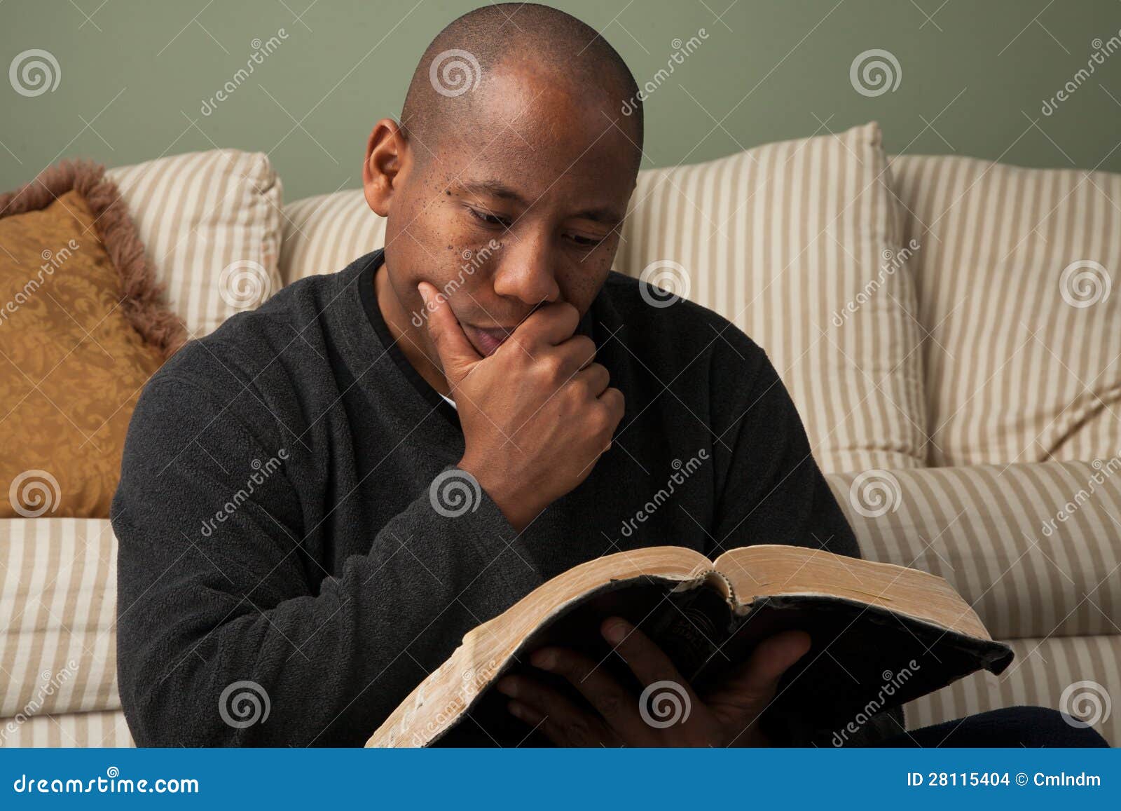 man studying the bible