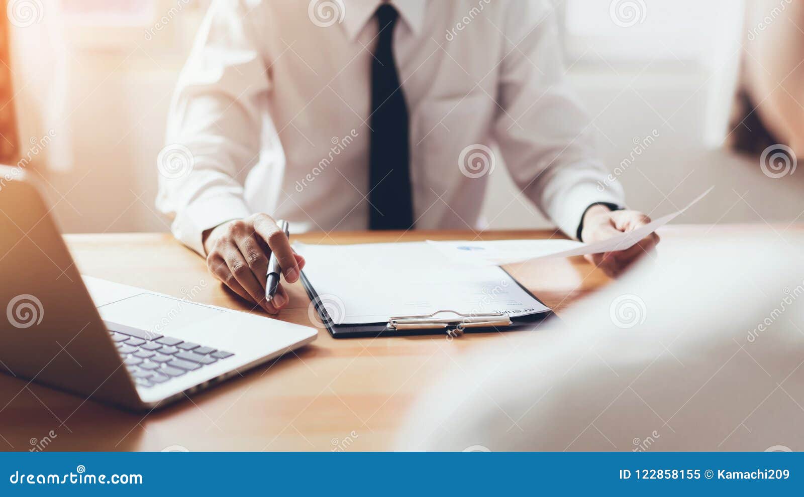 man submit resume to employer to review job application.