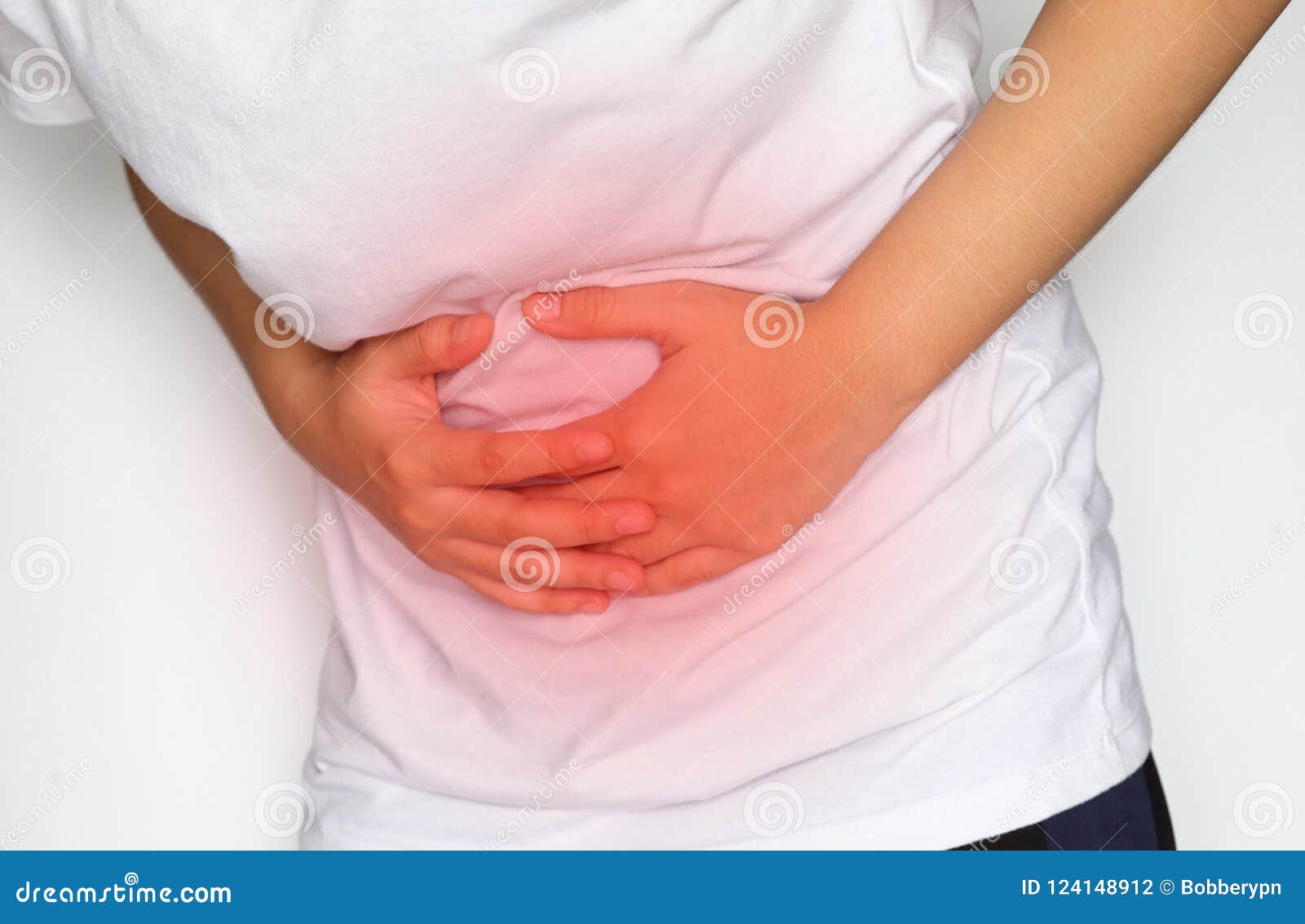 Man suffering from flank pain on white background Stock Photo - Alamy