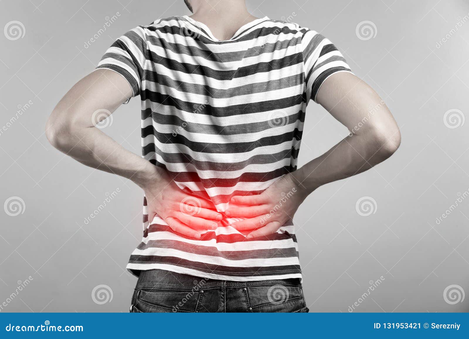 Man Suffering From Back Pain On Grey Background Stock Image Image Of