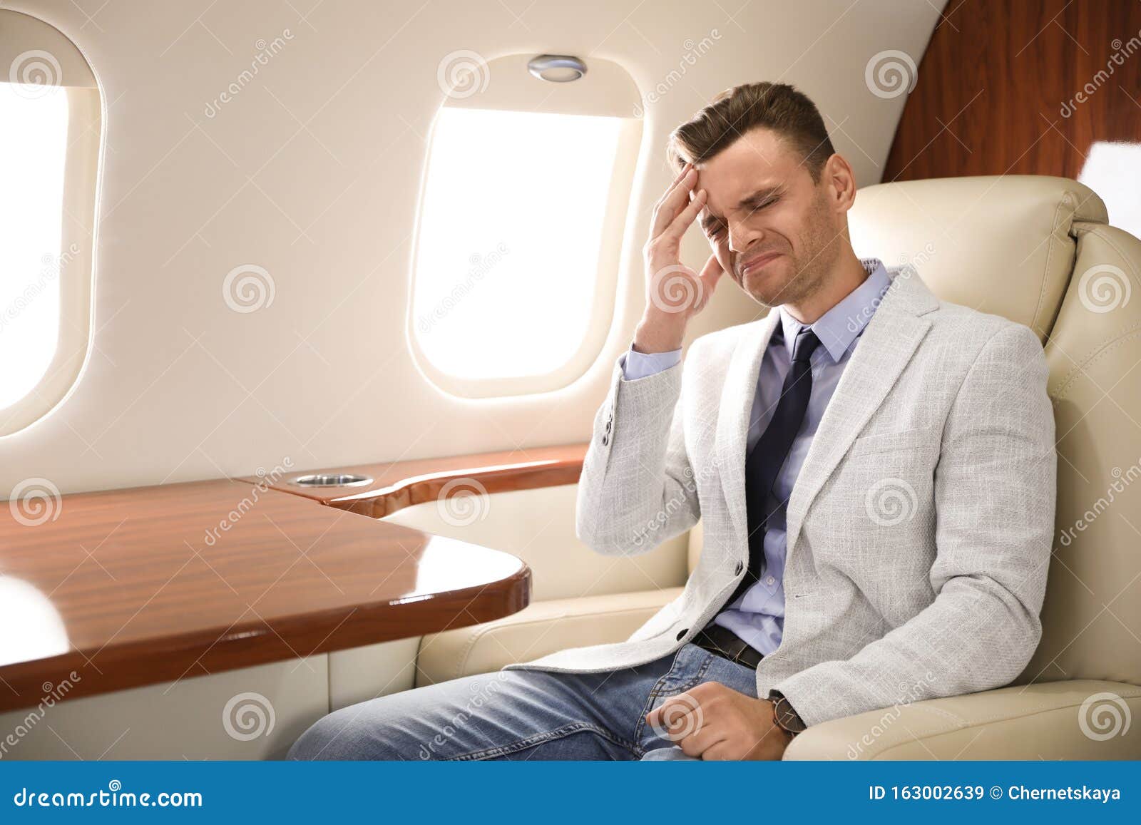 Man Suffering from Headache during Flight Stock Image Image of motion