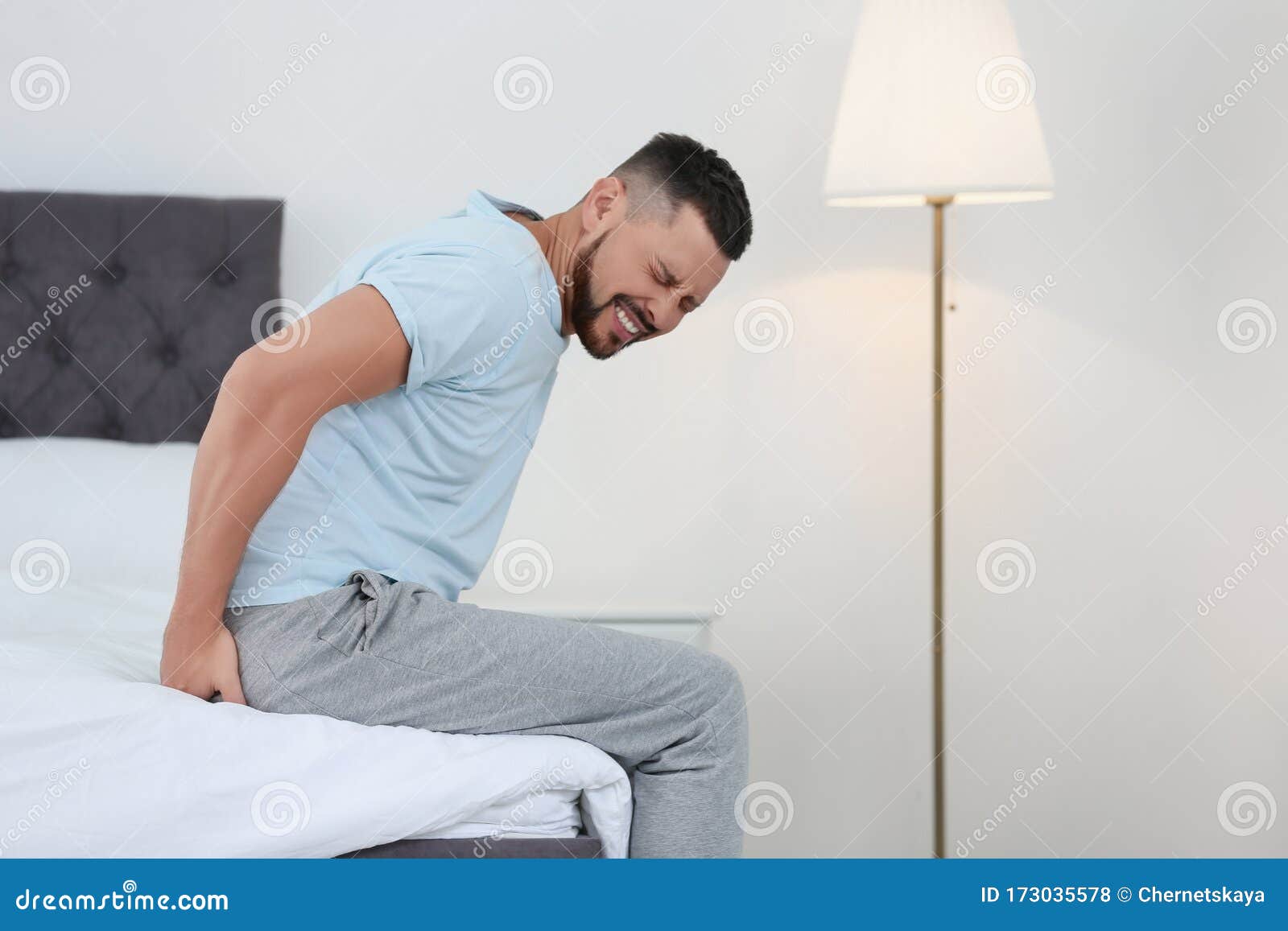 Man Suffering from Hemorrhoid on Bed Stock Photo Image of hemorrhoid