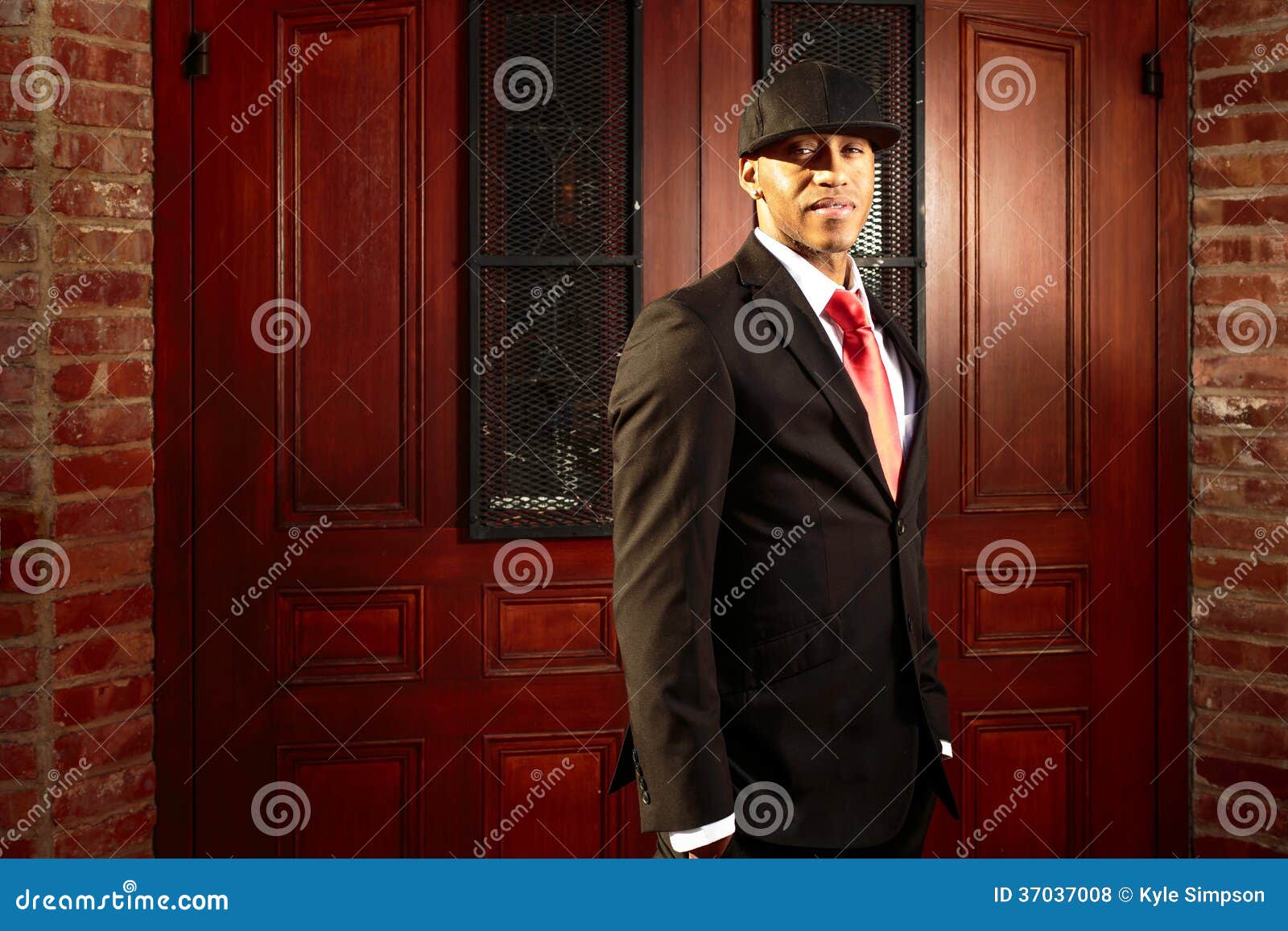 Man in Suit in Front of Old Doors Stock Photo Image of chief