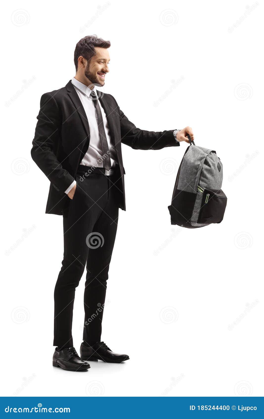man holding backpack