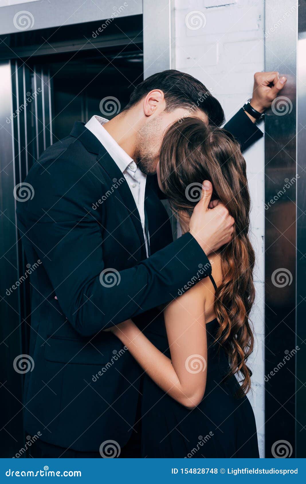 Man In Suit Passionately Kissing And Stock Photo Image Of Passionate Fashionable