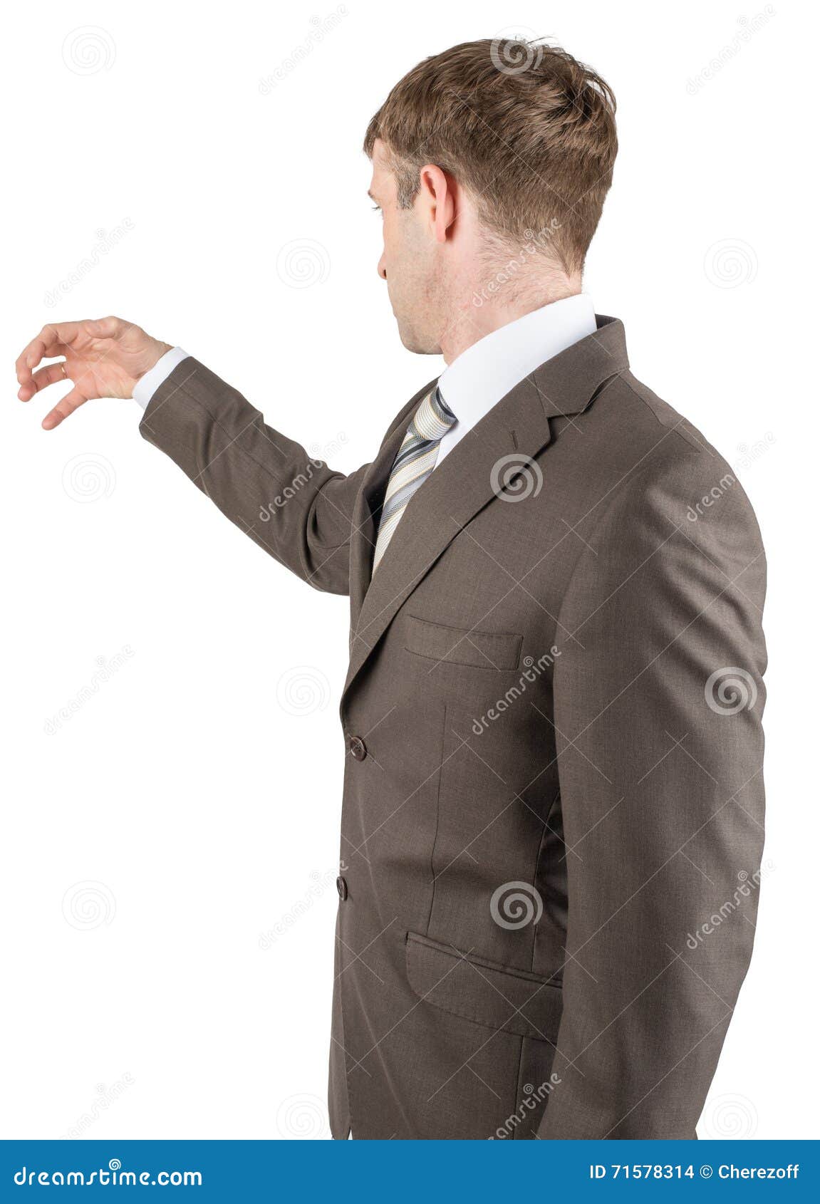 Man in Suit Reaching for Something from Stock Photo Image of grab