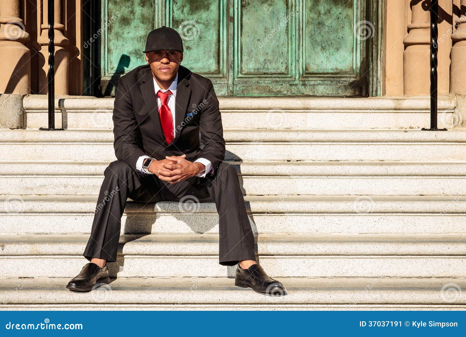Man in Suit Sitting on Steps Stock Image Image of executive, color