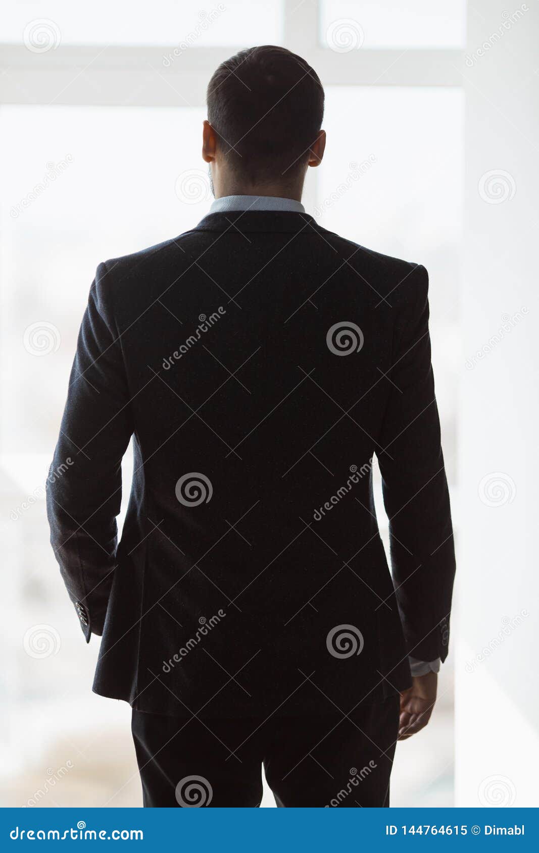 A Man in Suite at the Window Stock Image - Image of evening, clothing ...