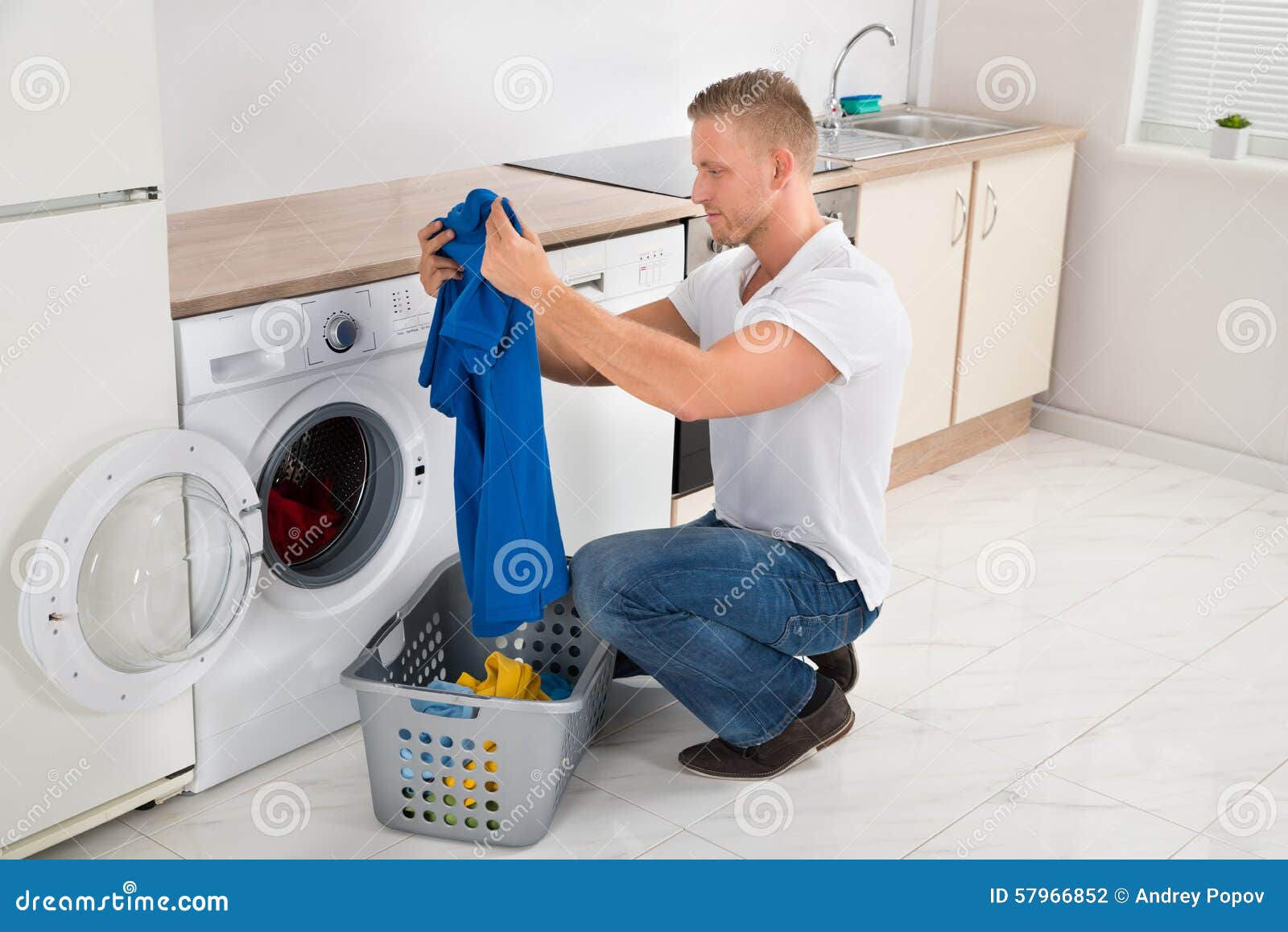 Man with Tshirt while Using Washing Machine Stock Photo Image of