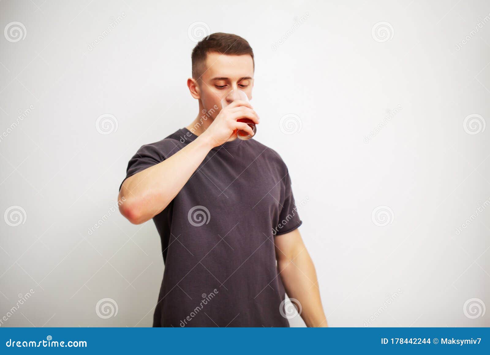 Man Takes a Pill of Amino Acids after Training. Stock Photo Image of