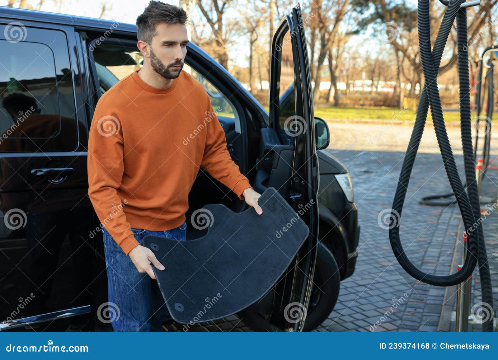Man Taking Carpets from Auto for Cleaning at Selfservice Car Wash Stock Photo Image of