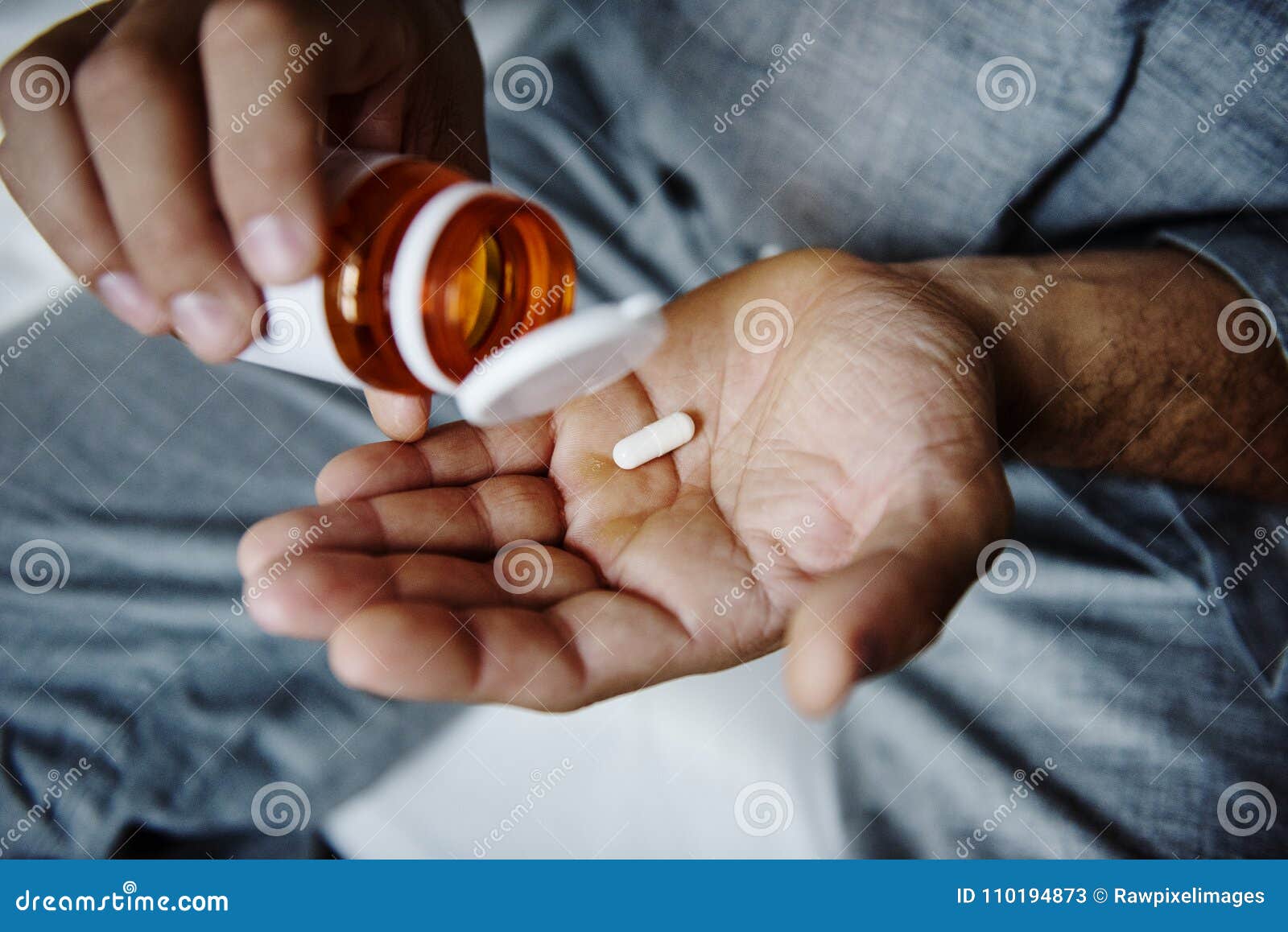 man taking medication health care