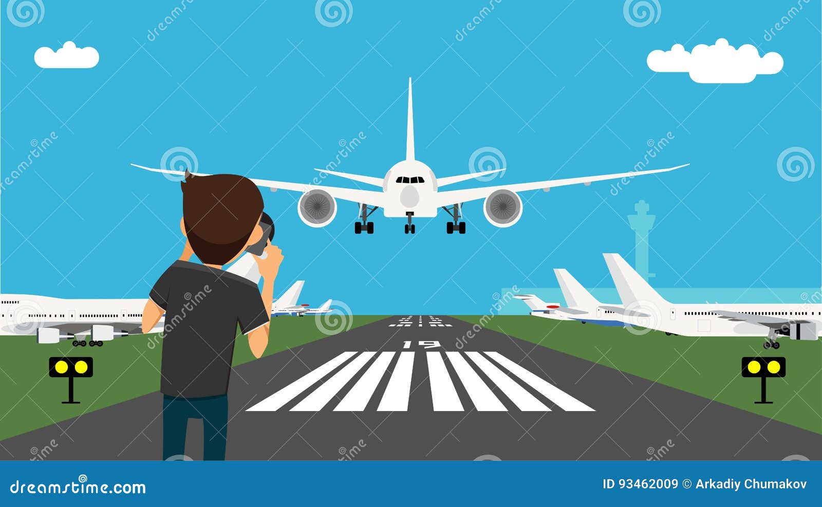 man taking picture of the glide path and landing plane using professional camera.