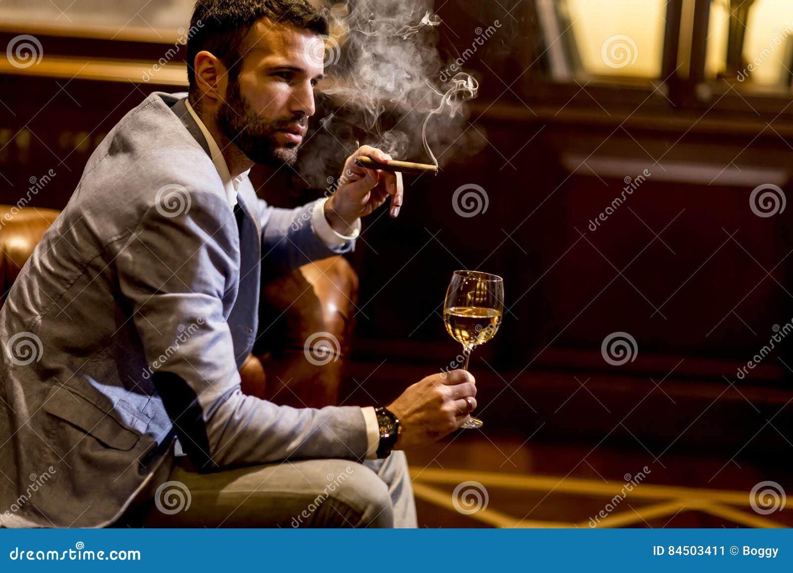 Man Tasting White Wine and Smoking Cigar Stock Image Image of serious