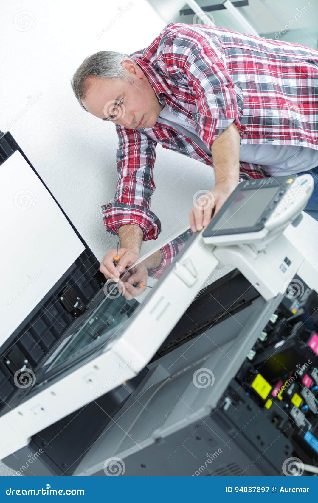 Man Technician Repairing Printer at Business Place at Work Stock Image