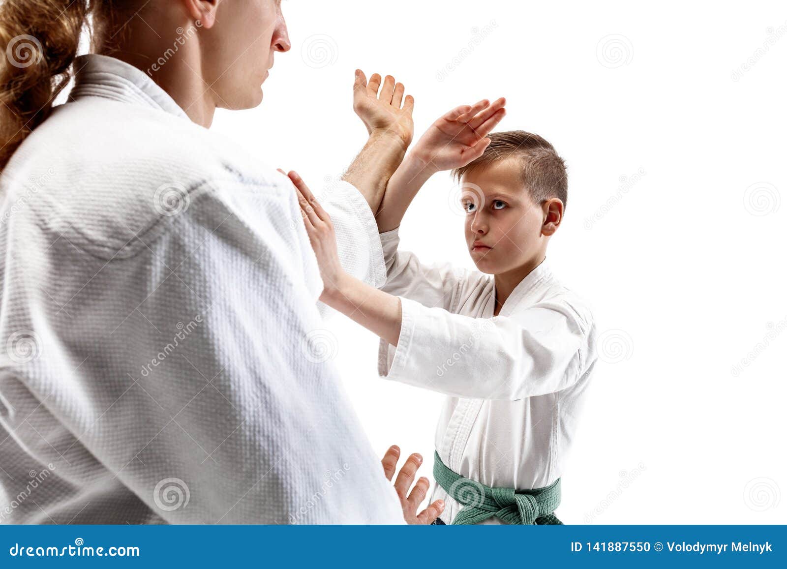 Man and Teen Boy Fighting at Aikido Training in Martial Arts School ...