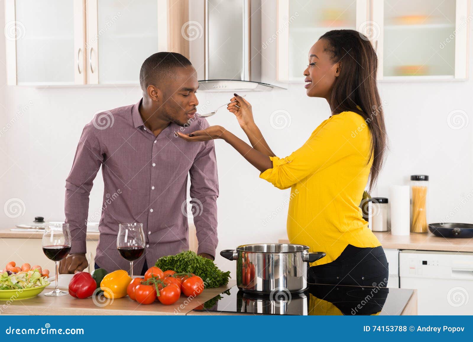 Man Testing Food stock photo. Image of holding, woman 74153788