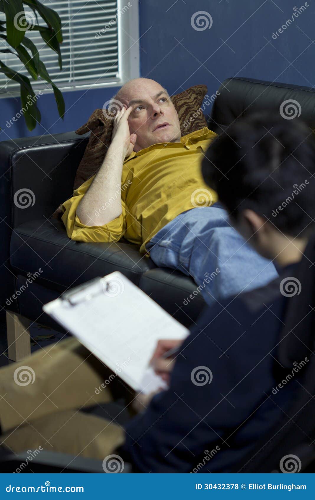 Man at a Therapy Session Talking about His Problems Stock Photo Image