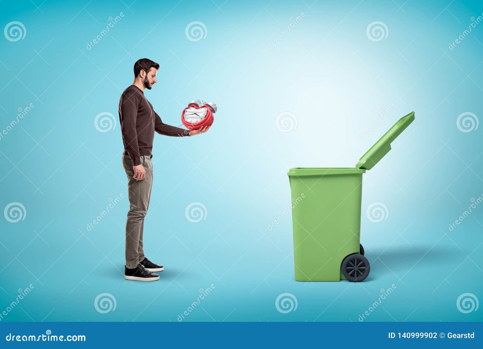 Man Throwing Broken Red Clock into Open Trash Bin on Blue Background