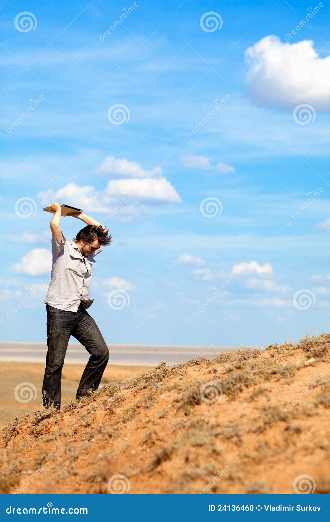 Man Throwing Laptop Outdoors Stock Photo Image of computer, hill