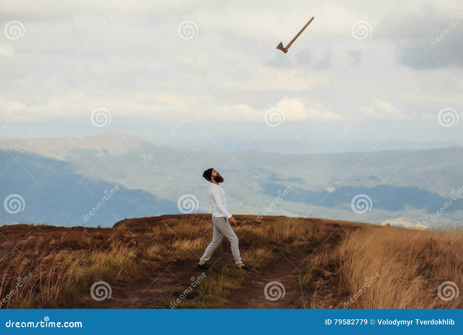 Man throws axe on mountain stock image. Image of adult 79582779