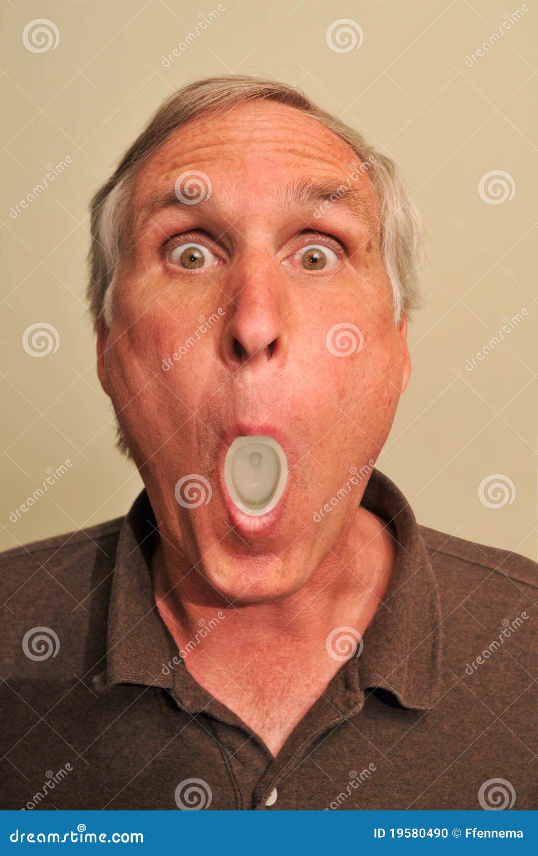 Man with a Toilet in His Mouth Stock Photo Image of face, potty 19580490