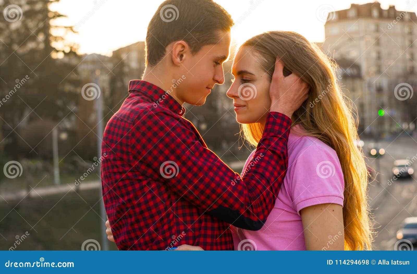 The Man is Touches Hair Young Woman on the Background of the Cit Stock Photo - Image of hair, backdrop: 114294698 The Man is Touches Hair Young Woman on the Background of the Cit Stock Photo - Image of hair, backdrop: 114294698