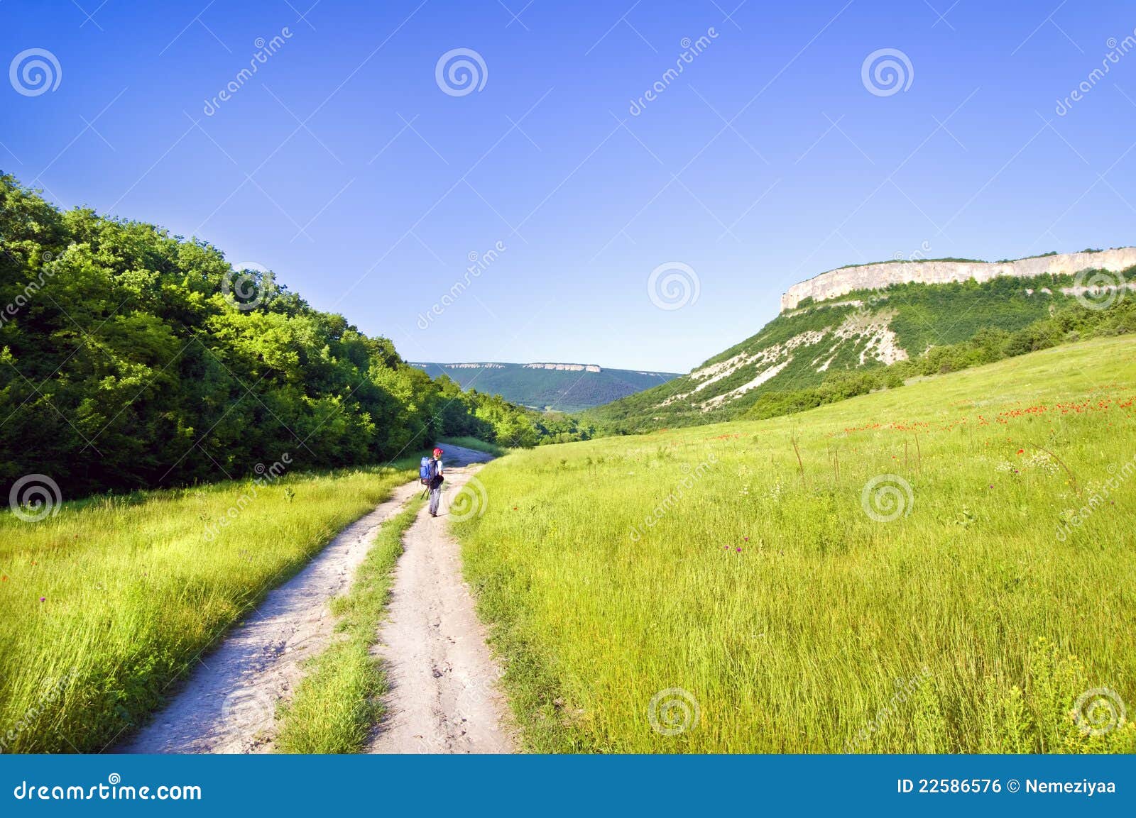 Man tourist in mountains. Leisure activity.