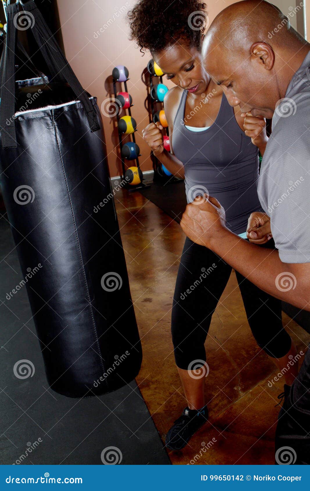 Trainer Training His Client in Kick Boxing. Stock Photo Image of