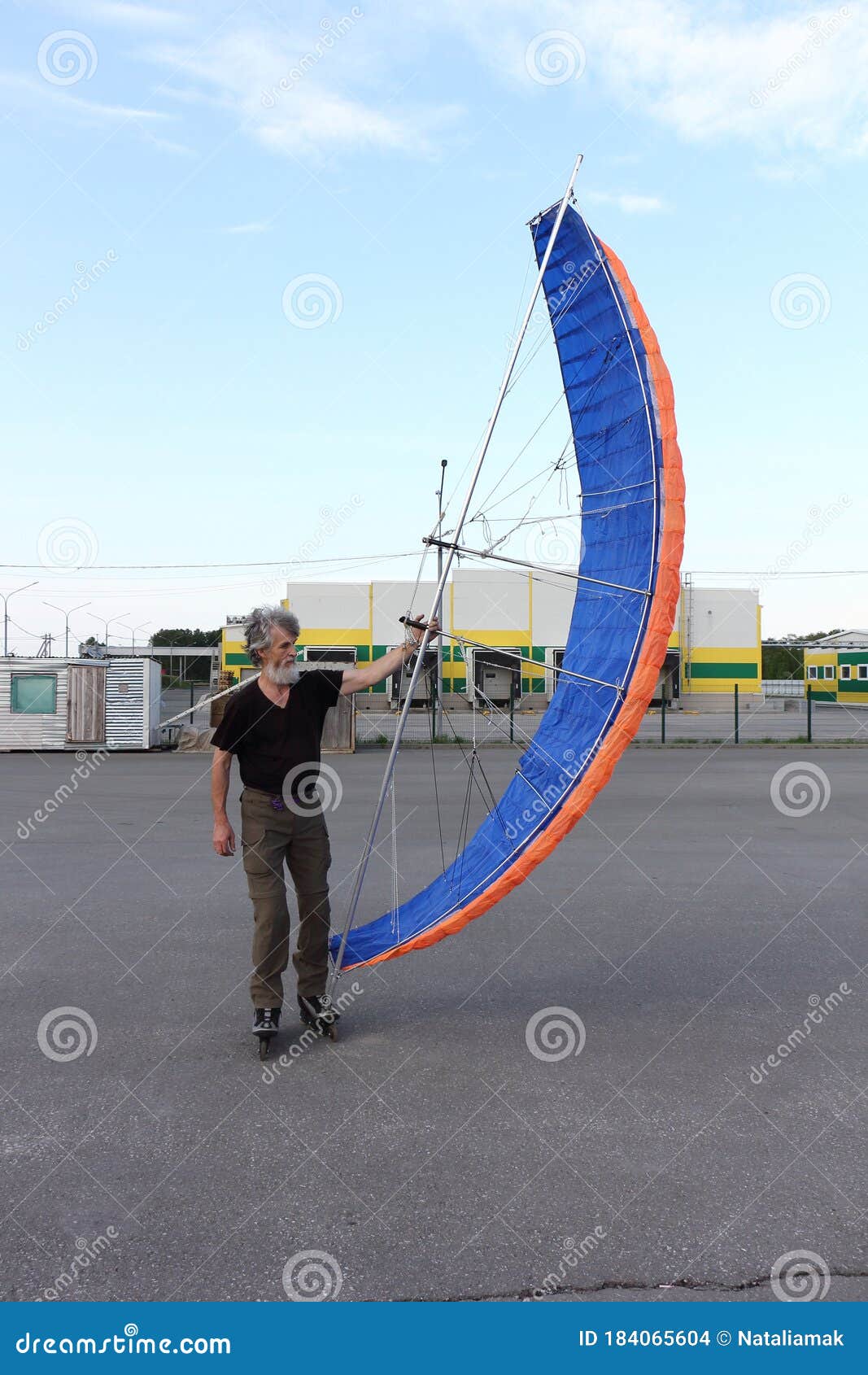 Man Training in Roller Skating with Kite Stock Photo Image of