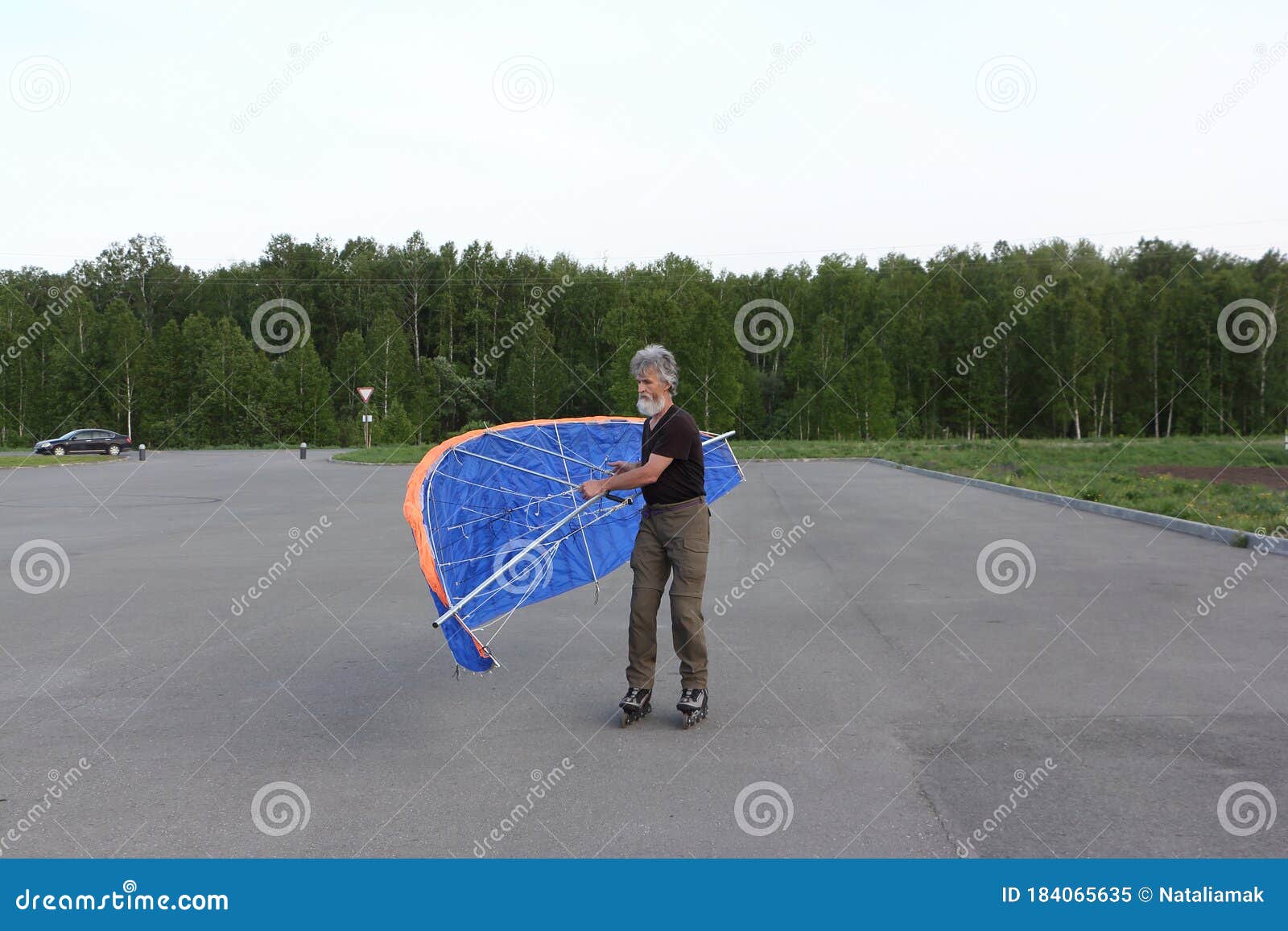 Man Training in Roller Skating with Kite Stock Image Image of ride
