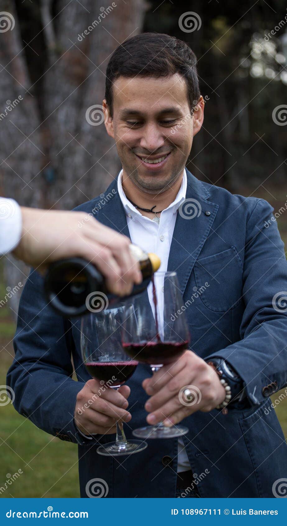 Pouring Two Glasses of Wine at a Time Stock Image Image of event