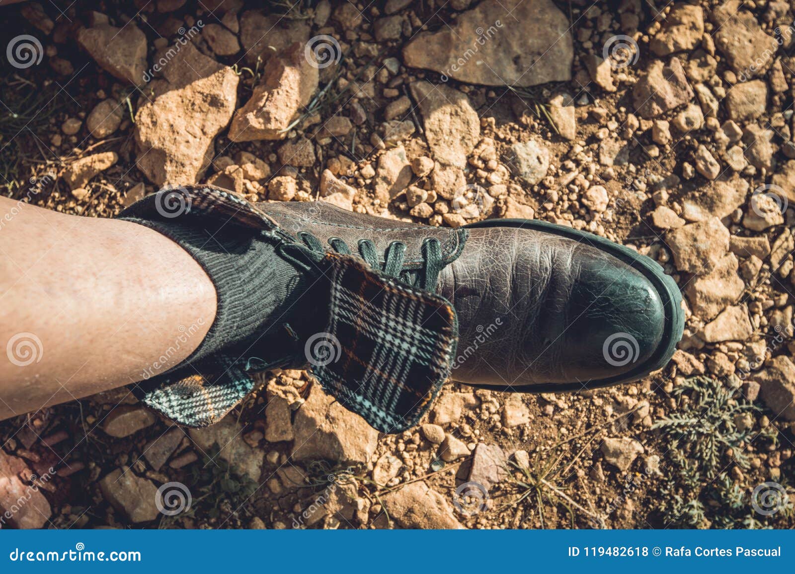 Man Tying His Boots on the Mountain Stock Photo - Image of sport ...
