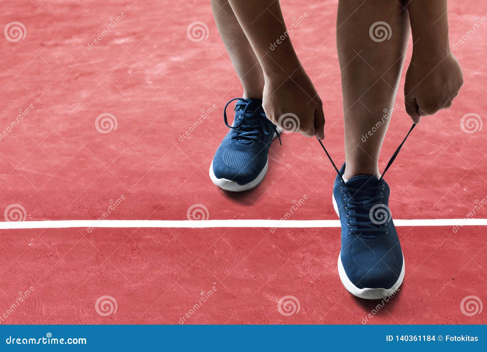 Man Tying Running Shoes on Racing Track Stock Photo Image of footwear