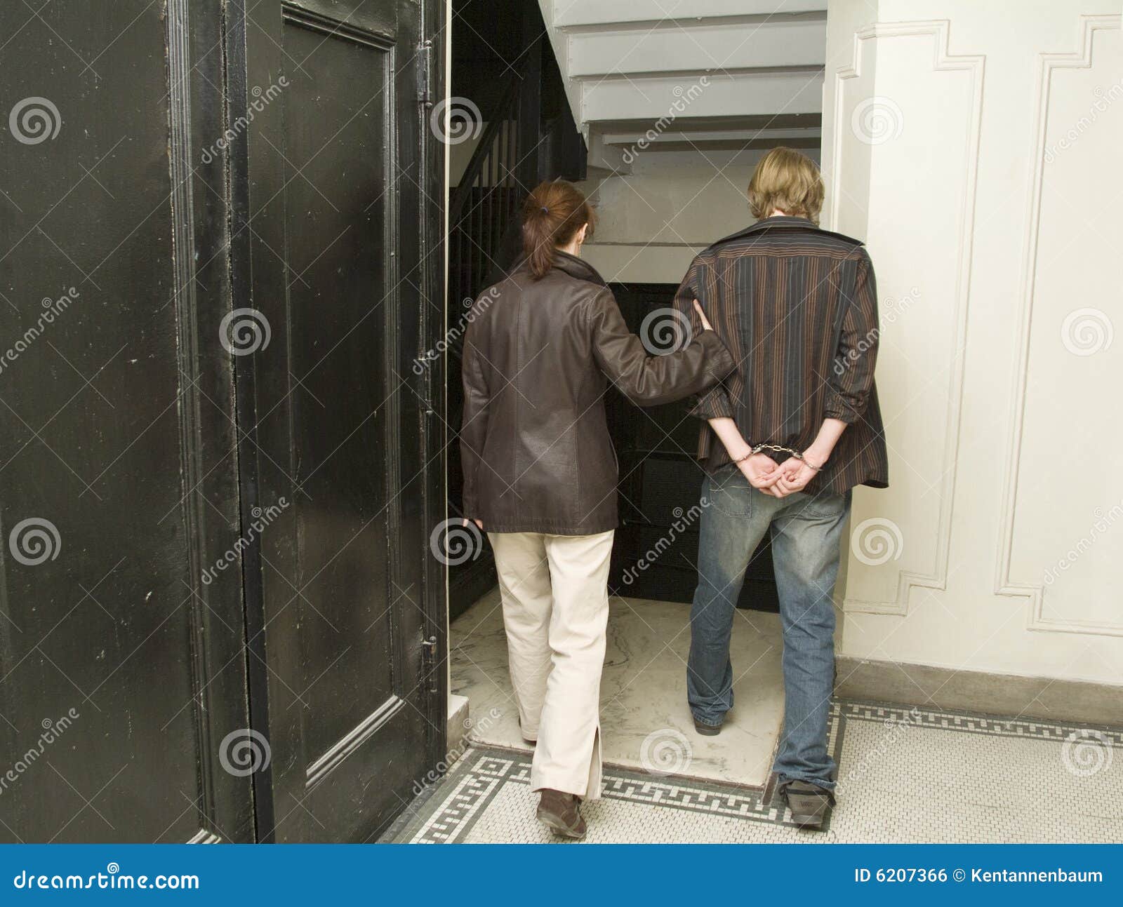 Man Under Arrest in Handcuffs_1 Stock Photo Image of arrested, back