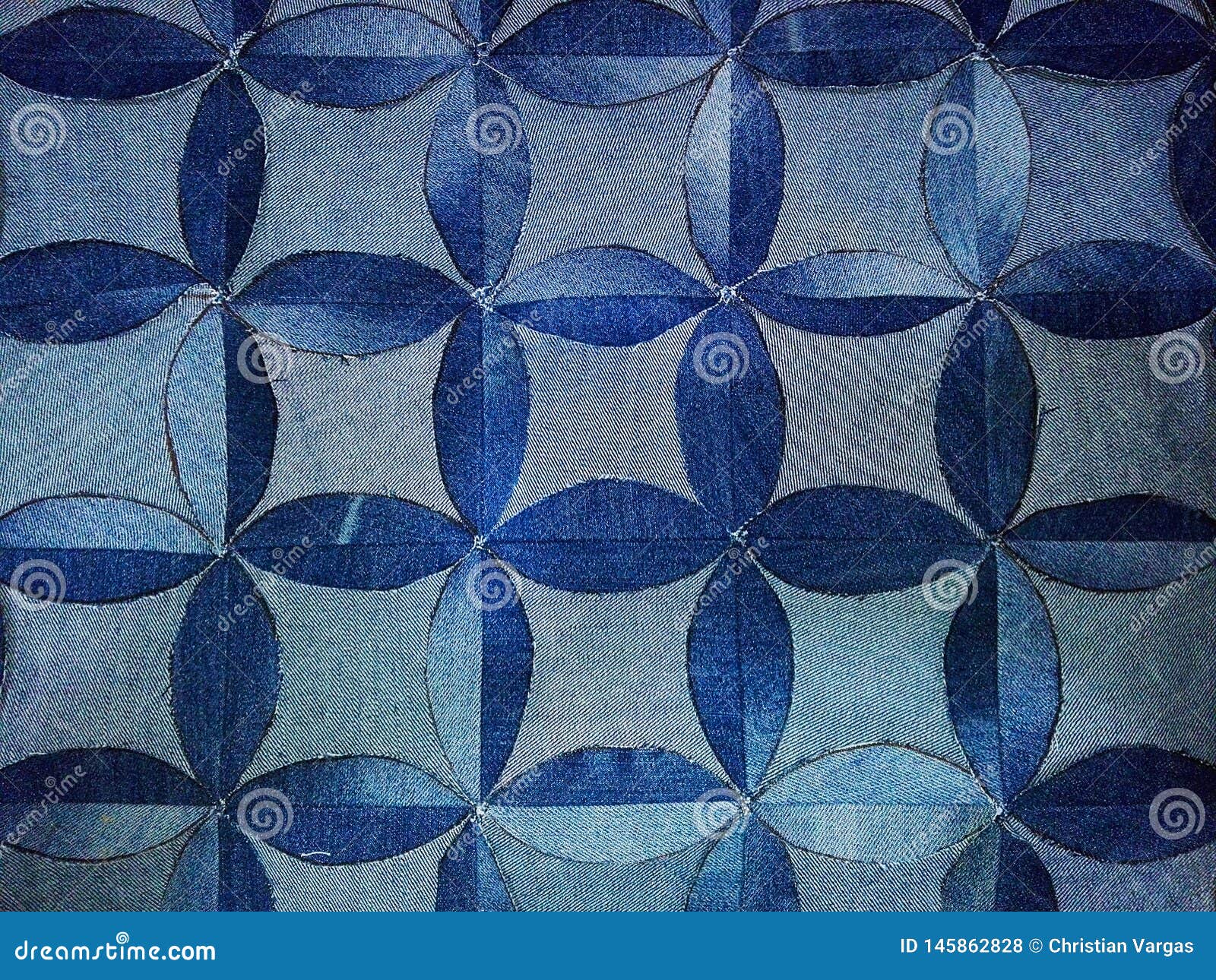 pattern of blue flowers, forming curved rhombuses,