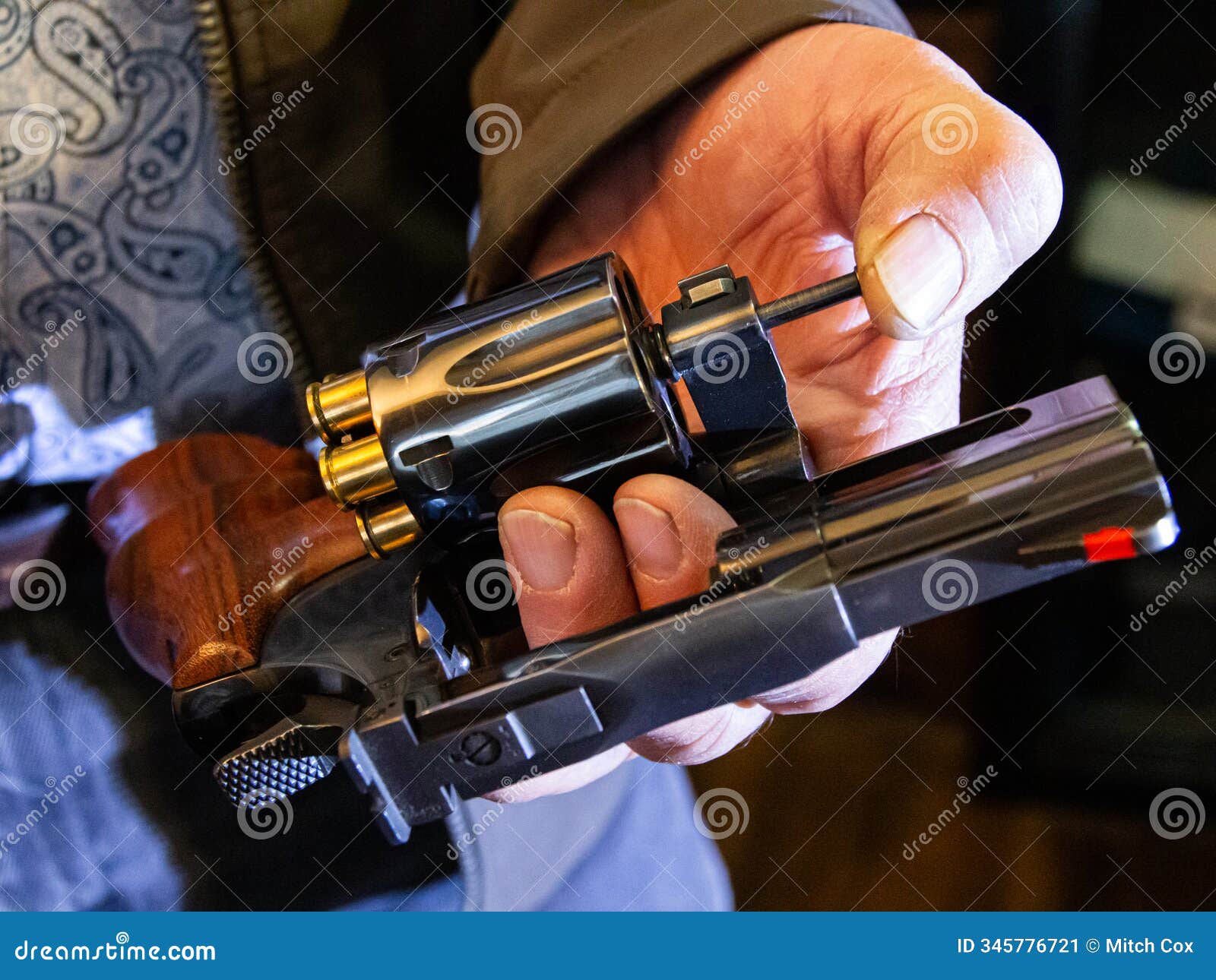 ejecting spent casings from a revolver