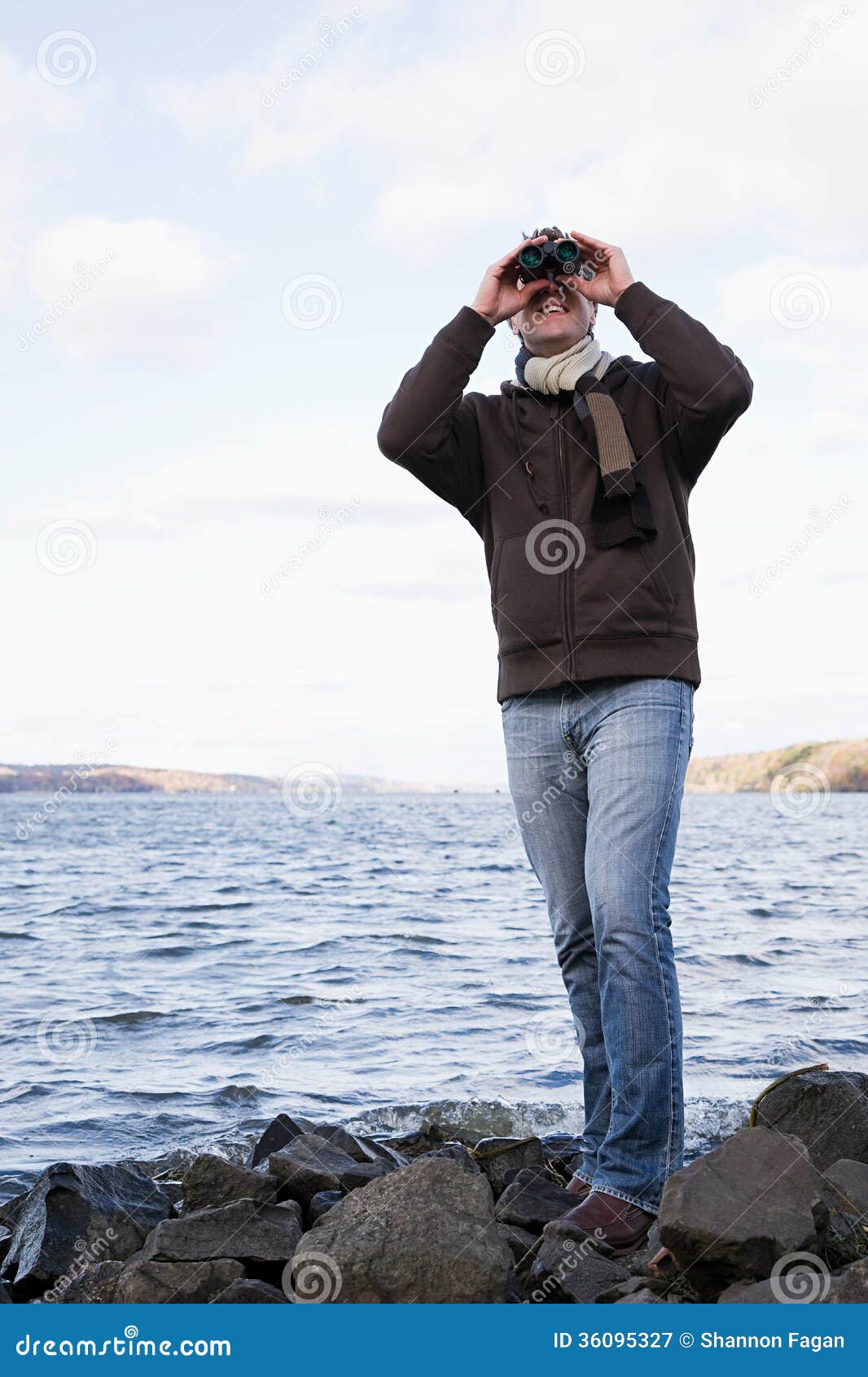 a man using binoculars