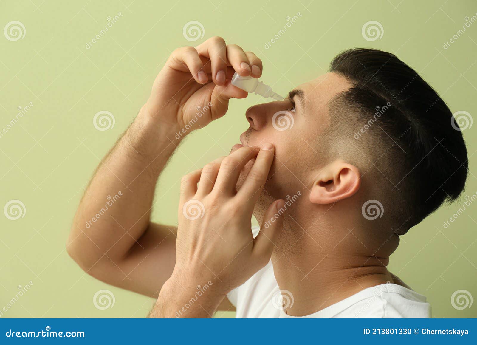 Man Using Eye Drops on Green Background Stock Photo Image of allergy
