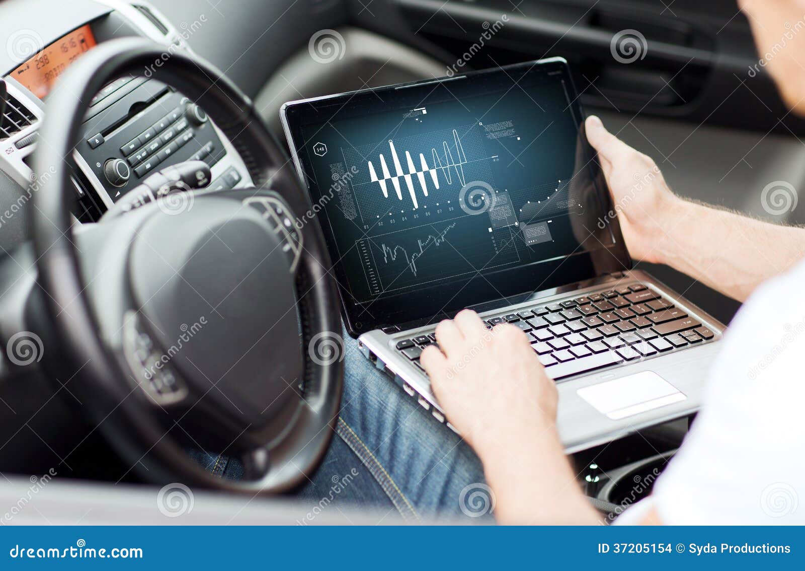 man-using-laptop-computer-car-transporta