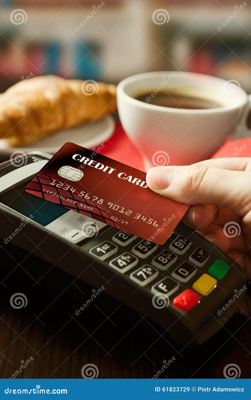 Man Using Payment Terminal with NFC Technology in Cafeteria Stock Image