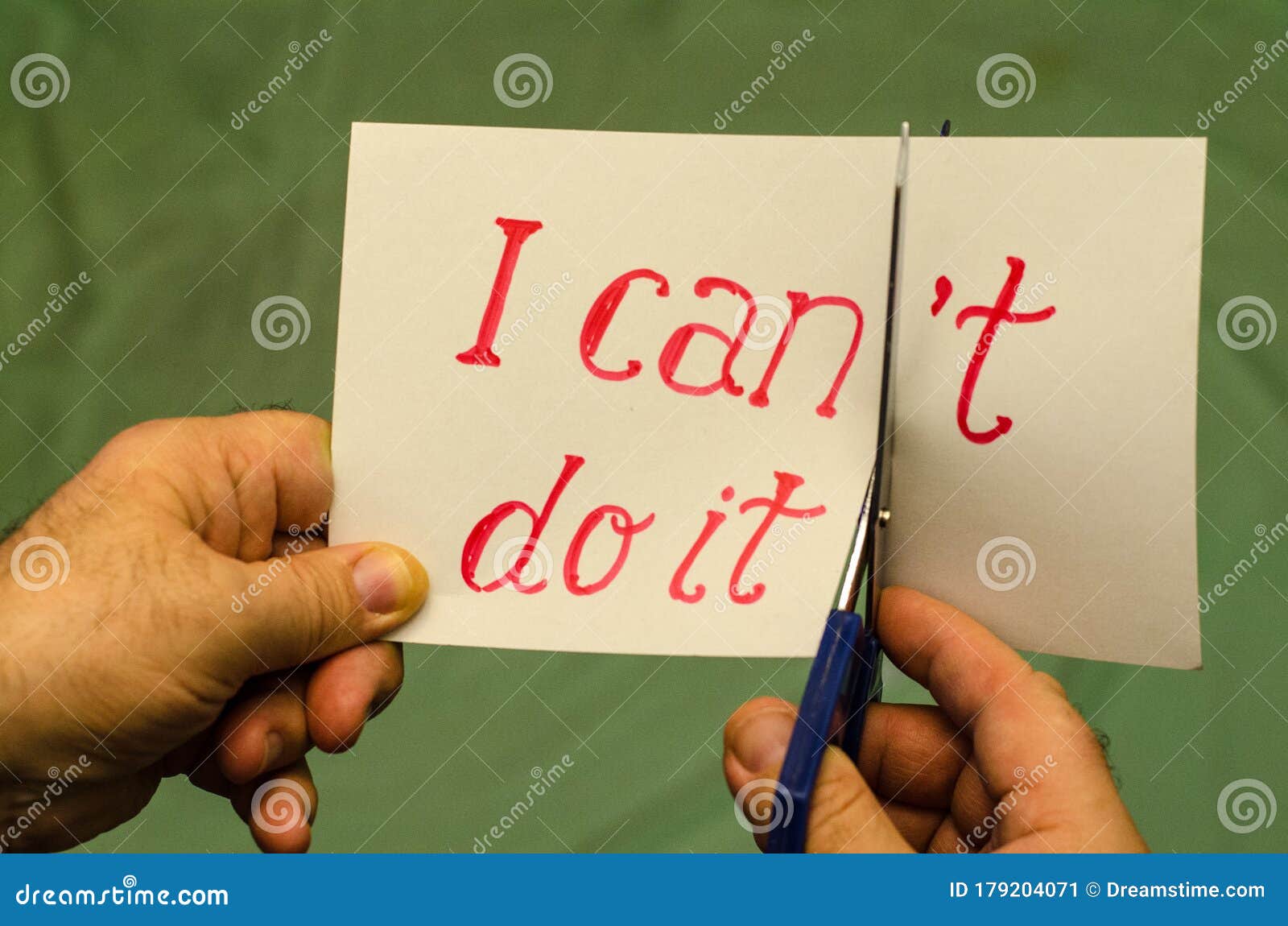 Man Using Scissors To Remove The Word Can T To Read I Can Do It Stock Image Image Of Encouragement Motivate