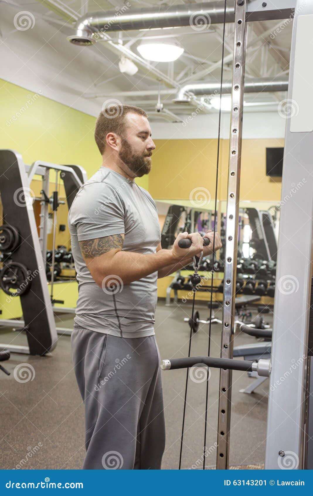 Man Using Straight Bar Cable Pull Stock Image Image of activity