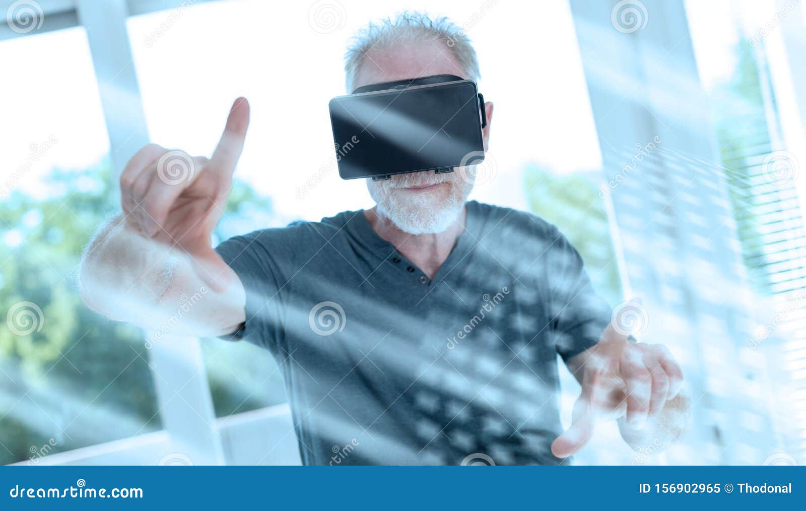 Man Using a Virtual Reality Headset; Light Effect Stock Image Image