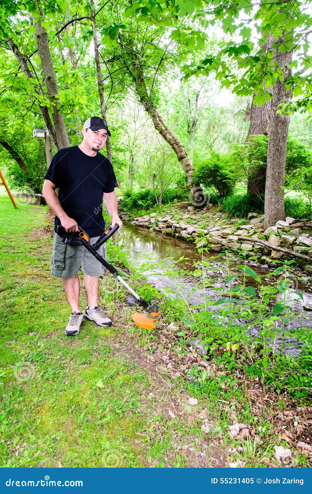 Man Using Weed Trimmer Smiling Stock Image Image of spring, mowing