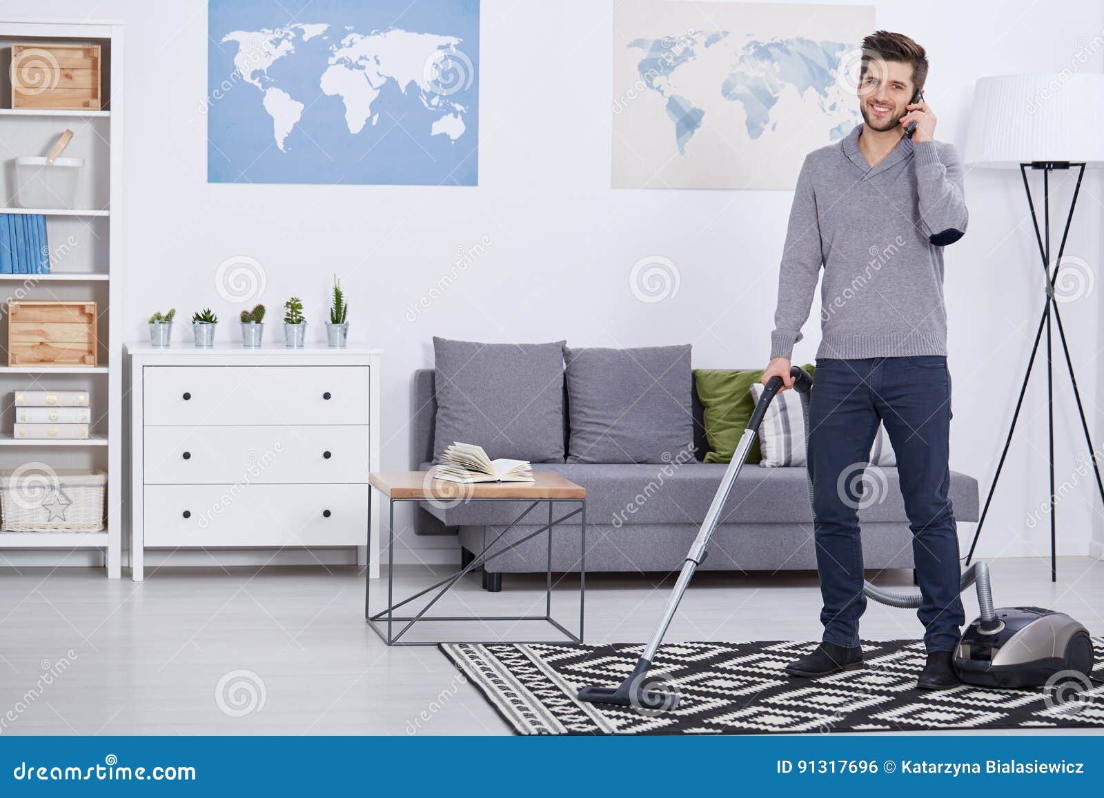 Man Vacuuming and Talking on the Phone Stock Photo Image of order, busy 91317696