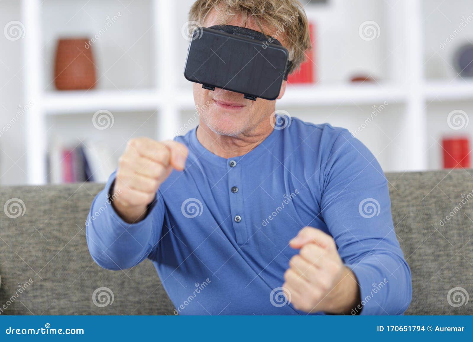 Man in Virtual Reality Headset and Car Racing Game Stock Photo Image