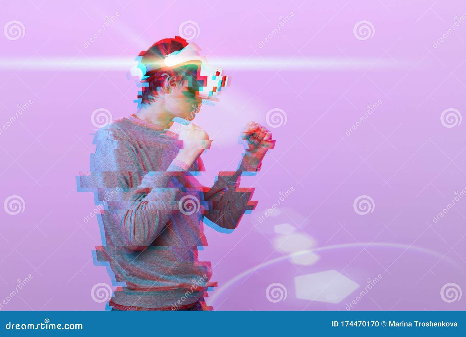 Man with Virtual Reality Headset is Playing Game and Fighting. Image