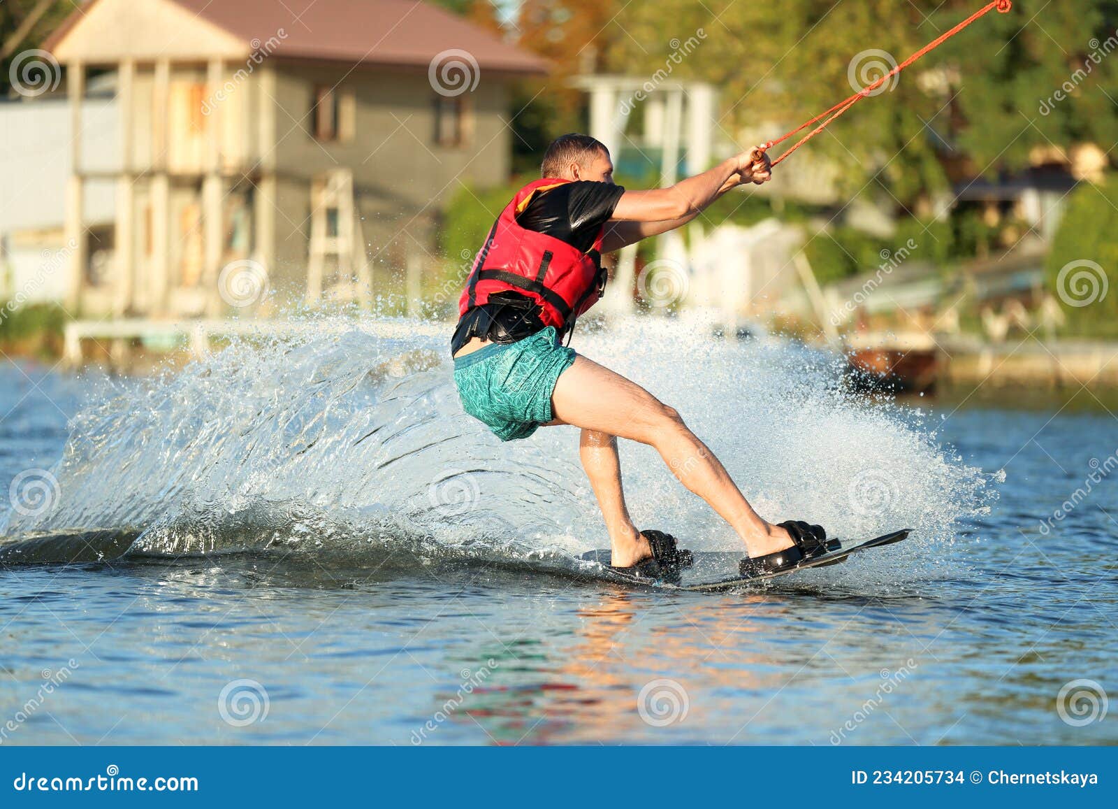 Man Wakeboarding on River. Extreme Water Sport Stock Photo Image of